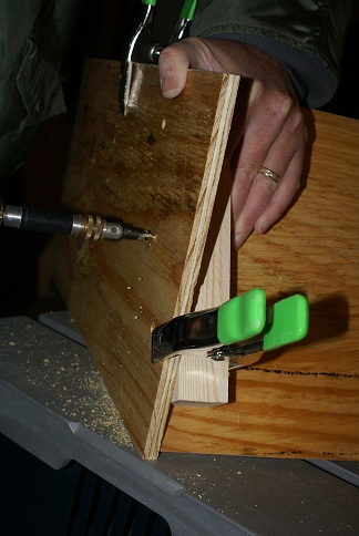 Drilling the end and side with the side clamped to the end