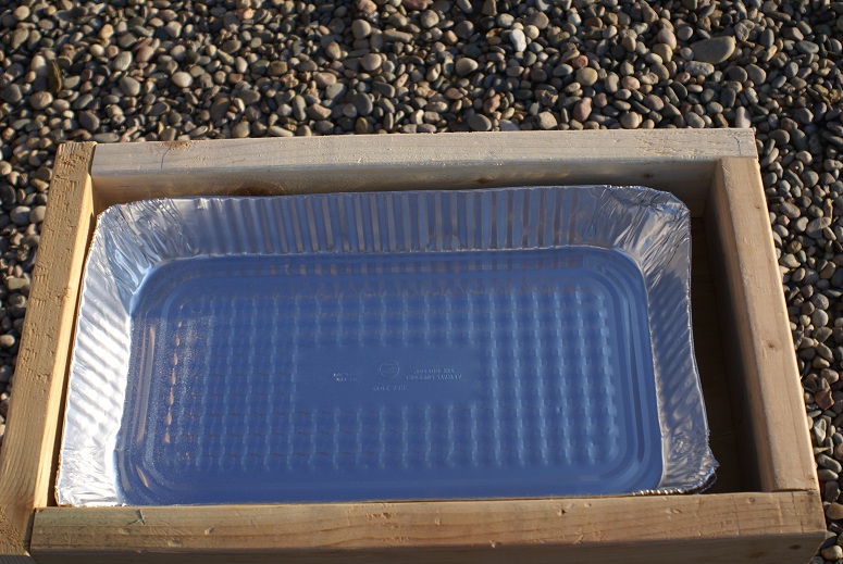 The box with the aluminum pan.